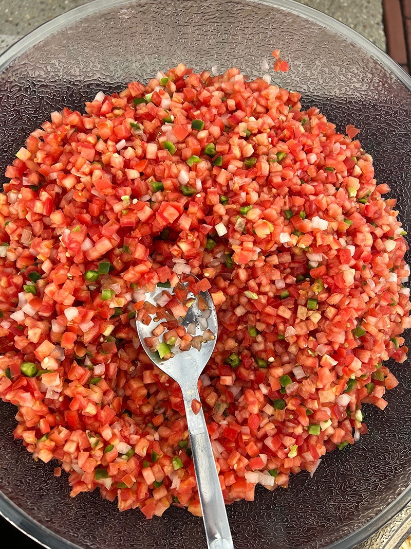 Fresh pico for topping (just one of the many chili topping options) A bowl of pico de gallo