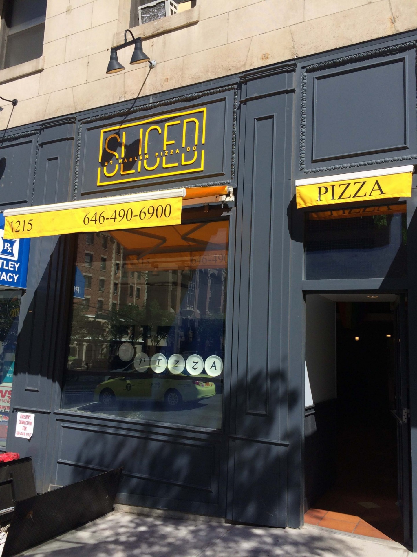 Sliced by Harlem Pizza Co, located at 1215 Amsterdam Ave, is accepting orders for take-out and delivery. Storefront of Sliced by Harlem Pizza Co