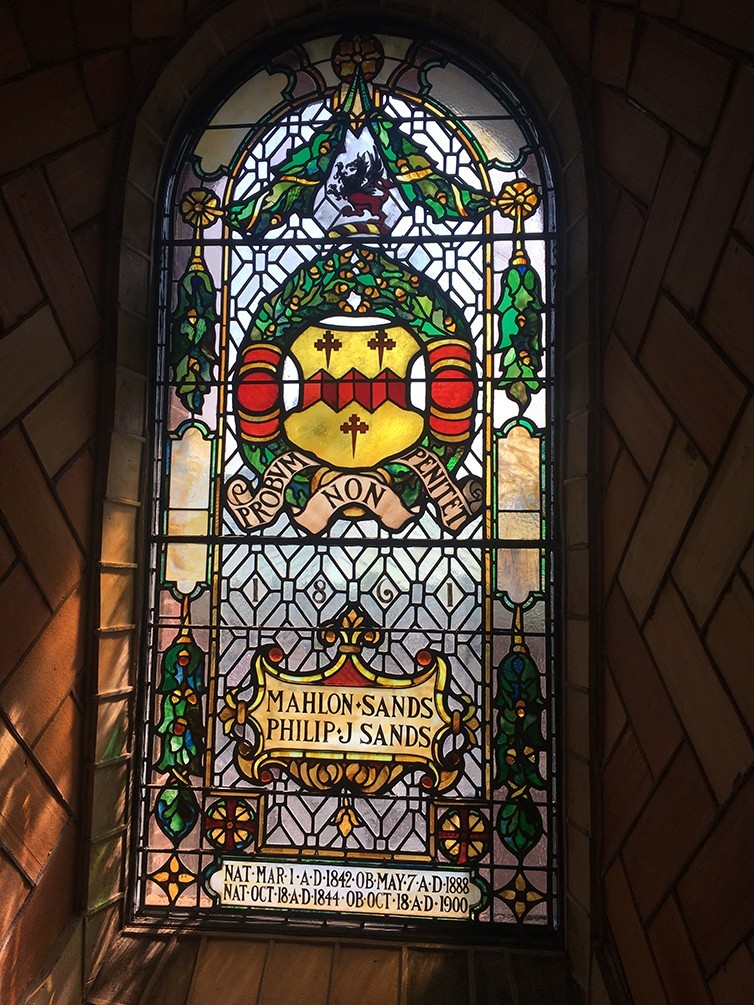 A restored stained glass window inside the chapel dome. This window honors Mahlon and Philip Sands.