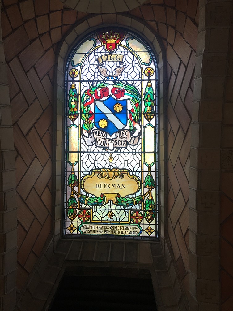 A restored stained glass window inside the chapel dome. This window honors the Beekman family.
