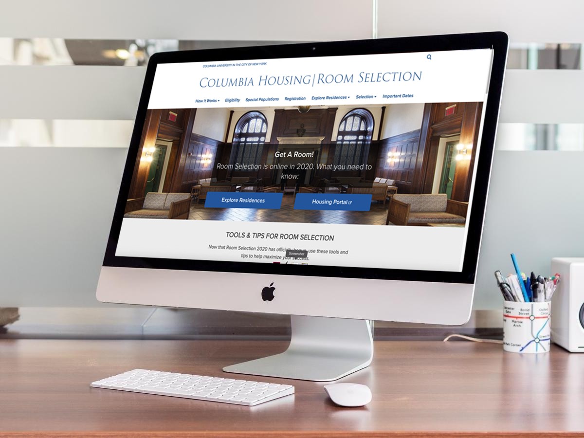 Room Selection website shown on an iMac
