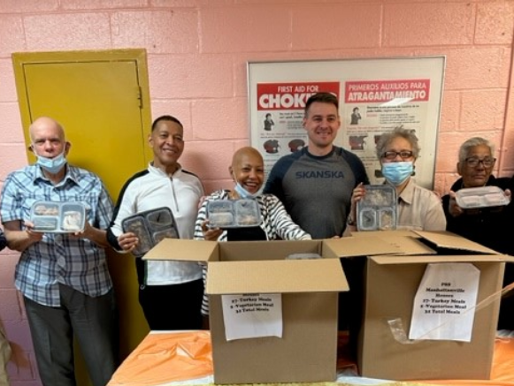 Members from the Manhattanville Senior Houses receiving their pre-thanksgiving meals 