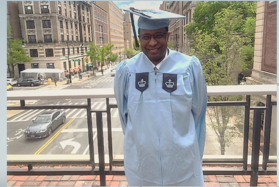 CUFO 2021 grad with Columbia cap and gown